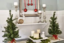 08 evergreen trees, a display with evergreens and candles and a framed ornament artwork