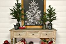 10 Christmas toys, evergreen trees, a chalkboard sign and red touches make up a vintage look