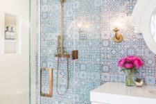 10 a statement mosaic tile wall in blue to make your bathroom more eye-catchy