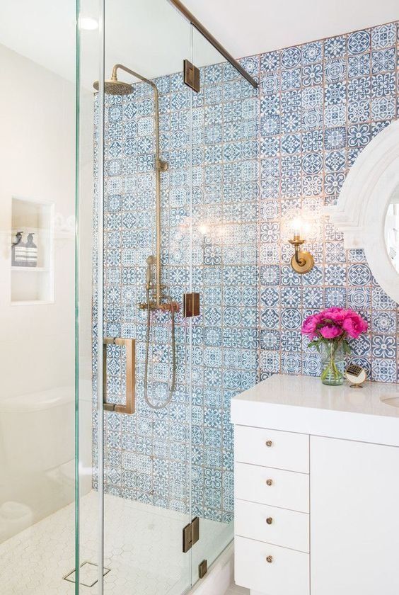 a statement mosaic tile wall in blue to make your bathroom more eye-catchy