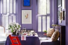 10 an ultra violet breakfast space with violet walls, furniture and a table