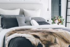 12 stylish grey, white and black bedding, faux fur and a chunky knit pillow