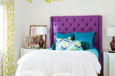 13 a colorful modern bedroom with a violet upholstered bed and pistachio touches