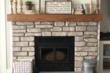 15 a natural stone fireplace with a wooden mantel looks very rustic, and you may add some rustic details