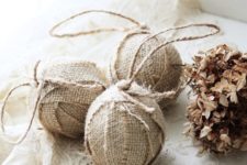 simple burlap wrapped ornaments with twine can be easily DIYed anytime