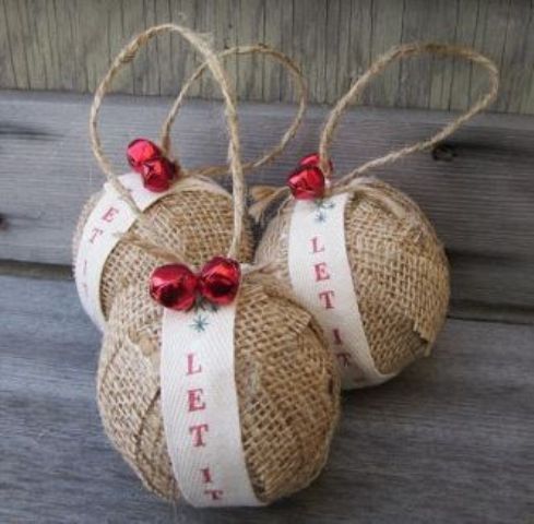 burlap ornaments with ribbon and red jingle bells are great for rustic tree decor