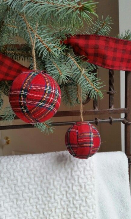 wrap ornaments with plaid yourself to make your tree look traditional and festive