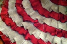 18 a red satin and burlap pleated Christmas tree skirt looks fun and cute