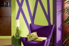 18 a violet upholstered chair and footrest, a matching pillar and a geometric artwork