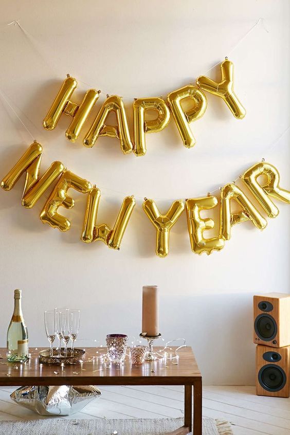 a gold balloon garland can be made by you and will decorate any zone or space
