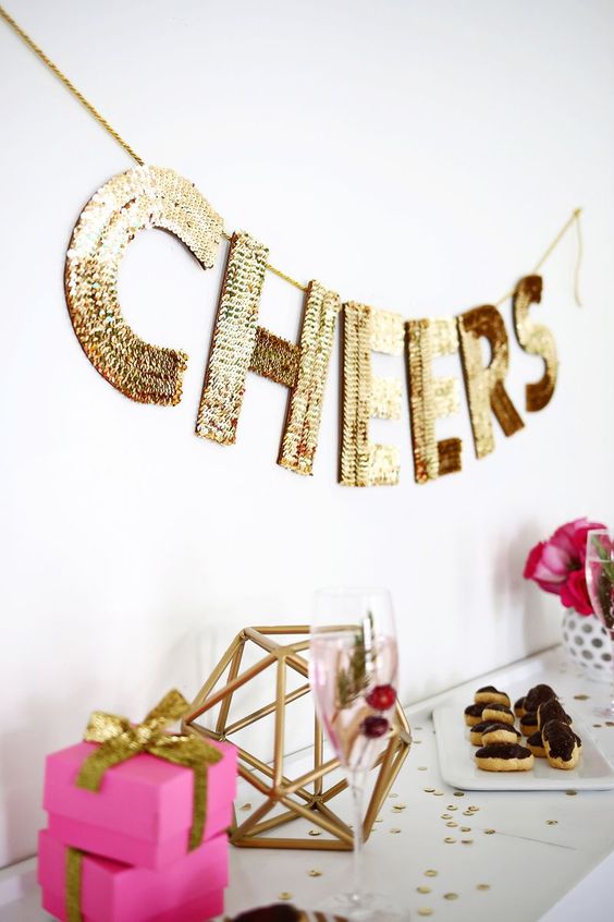 a gold sequin letter garland for decorating any space at home