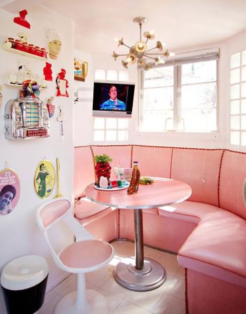 a small pink retro diner nook in the kitchen will add color to it and looks very wlecoming