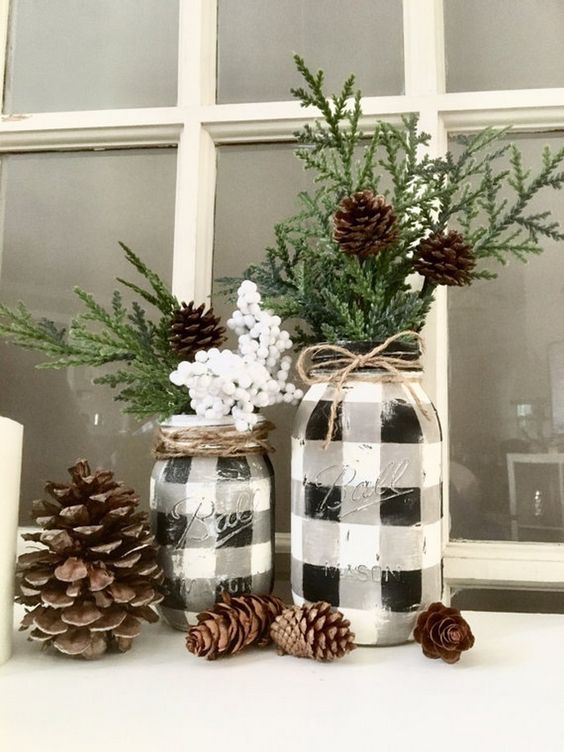 buffalo check vases of mason jars with evergreens and pinecones can be DIYed by you