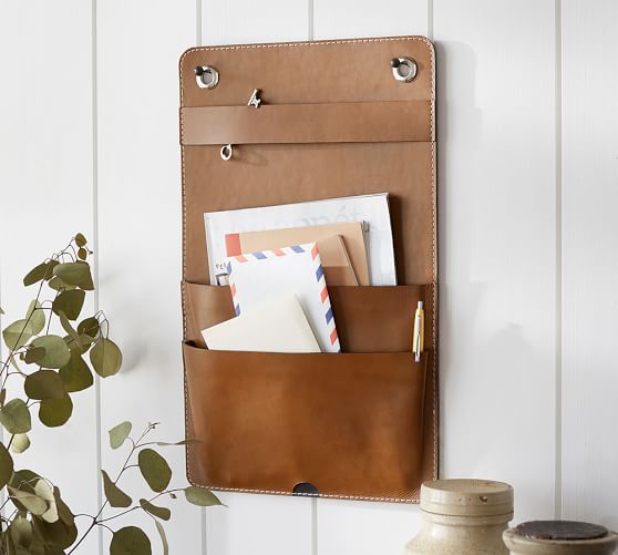28 Edgy Leather Home Decor Ideas To Try Digsdigs A Brown Leather Wall Storage Piece For An Entryway Put Your Keyail Here