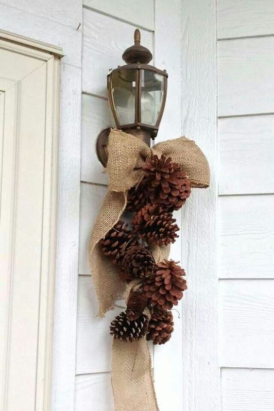 a burlap and pinecone decoration for outdoors can be made in a couple of minutes