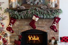 26 plaid stockings, plaid ornaments and decorations plus a plaid blanket