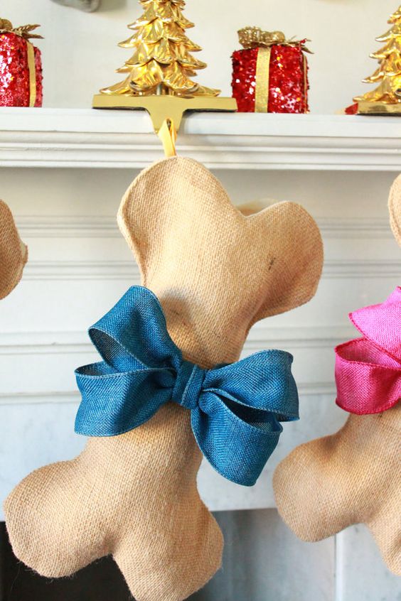 creative dog bone stockings with large bows for a home of dog lovers