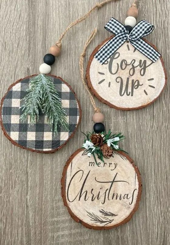 tree slice Christmas ornaments with evergreens, plaid and calligrapy and wooden beads are beautiful and cozy