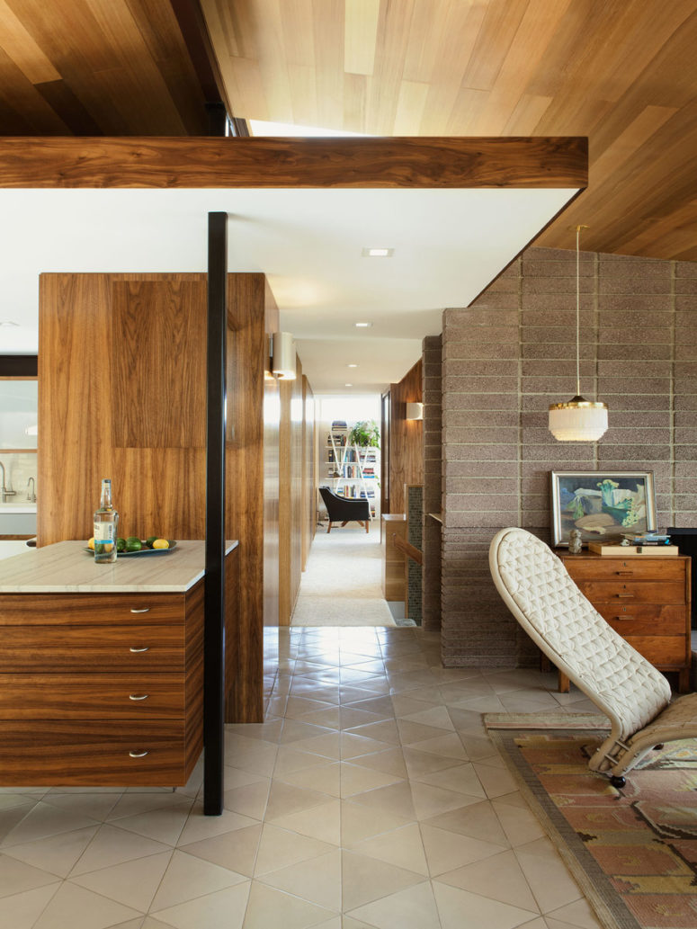 Much stone and concrete plus cool geometric tiles here and there add a textural feel and make the spaces more interesting Much stone and concrete plus cool geometric tiles here and there add a textural feel and make the spaces more interesting