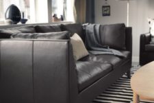 02 a black leather Stockholm sofa is a gorgeous and timeless idea, an ideal piece for a monochrome space