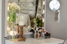 02 a chic makeup space with a Micke desk, an acrylic chair, a lit up mirror and a comfy makeup unit