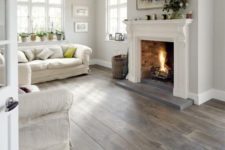 02 chic dark laminate floors for a whitewashed living room to create a contrast