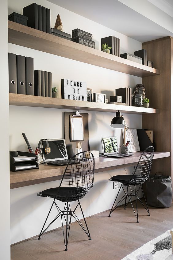 floating shelves and a matching desk under them for a modern and laconic home office