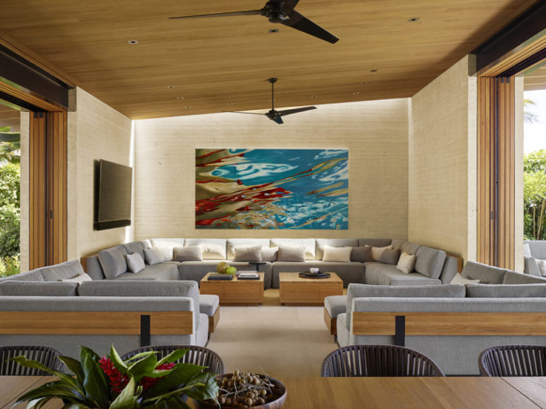 cool conversation pit in a living room The living room features a large corner sofa and two smaller corner ones for creating a large conversation pit