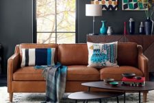 04 a Stockholm sofa in tan leather adds texture and comfort to this eye-catchy space
