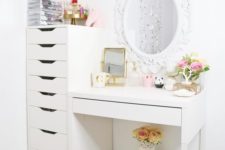 04 a chic makeup nook with several mirrors and a large drawer unit used for makeup storage
