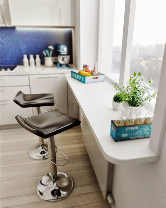 a modern windowsill bar with leather stools and a nice view to enjoy