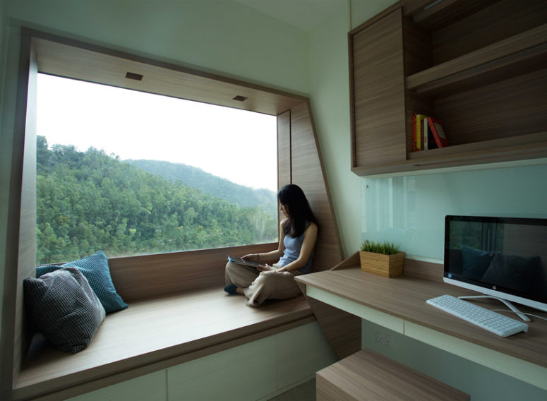 practical guest space The guest space features another window with a bench and a working space