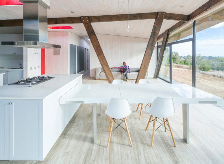 The walls are mostly glazed to maximize the views and light, and there's minimum of furniture to make the interior feel airy The walls are mostly glazed to maximize the views and light, and there's minimum of furniture to make the interior feel airy