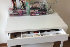 07 a simple makeup zone with a Micke desk and a stool, all the makeup in an acrylic unit