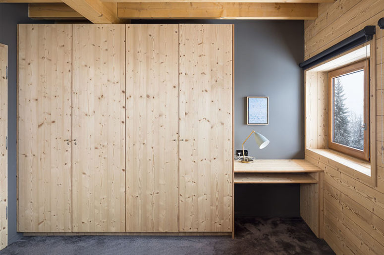 wooden wardrobes for lots of storage There are also several wardrobes for storage