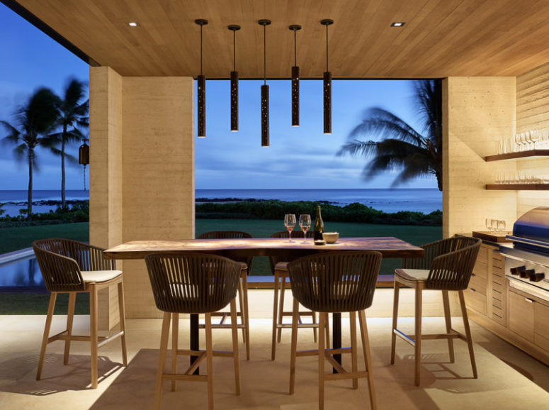 gorgeous dining space with a view The dining space is done with cool pendant lamps that highlight it