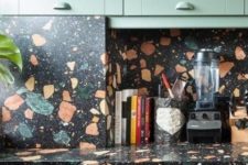 09 rock a bold terrazzo backsplash and countertops that match the cabinets somehow