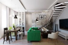 13 a green Stockholm sofa used as a space divider for the living and dining space