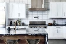 15 a modern ktichen with stainless steel and brass touches for a chic look