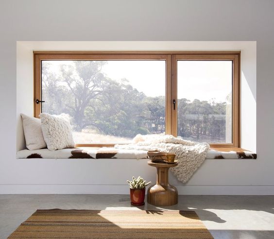 enjoy the views lying on a cool and comfy windowsill covered with faux fur