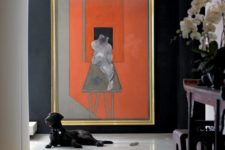 18 an oversized abstract artwork makes a bold stylish statement in this entry