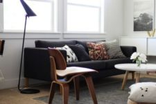 22 a black Stockholm sofa is a timeless idea that will fit most of interiors due to its neutral design