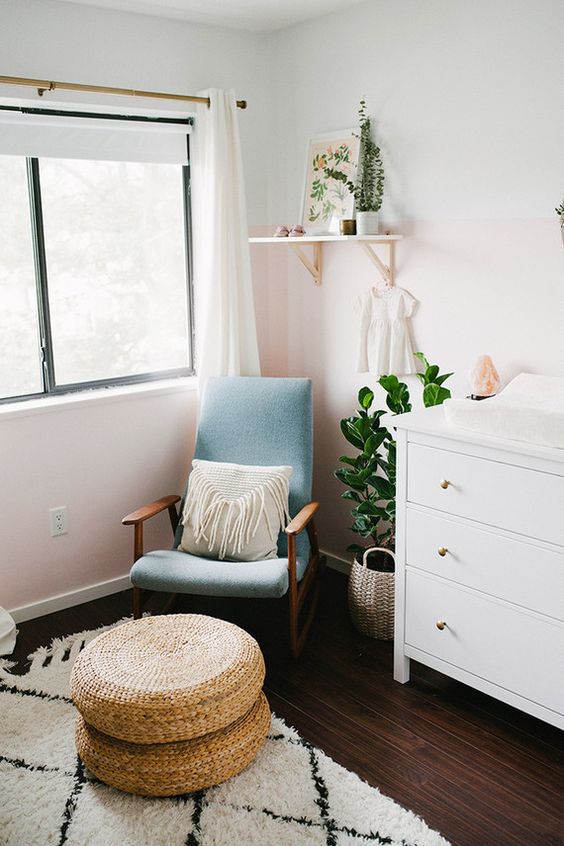 Poang chair re-upholstered in blue and stained to fit the nursery decor