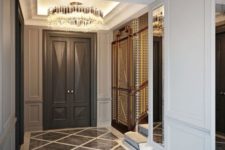 26 a couple of glam and super shiny crystal and metallic chandeliers for a refined modern space