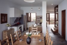 02 The dining space and kitchen are in an open layout, all the rooms are centered around the sea views