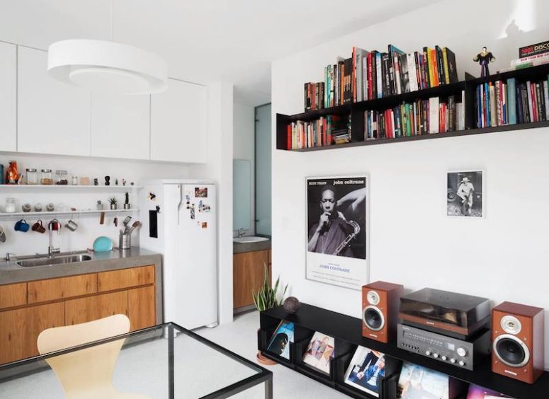 The kitchen and dining space are included into a large open layout that covers the bathroom and bedroom combo The kitchen and dining space are included into a large open layout that covers the bathroom and bedroom combo
