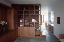 03 There’s much rich-colored wood and plywood in the interior blended with white for a contemporary yet cozy look