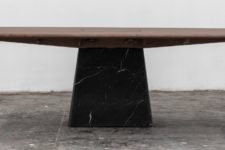 04 The Dolmen dining table is placed on a black marble base, too and has interesting edges
