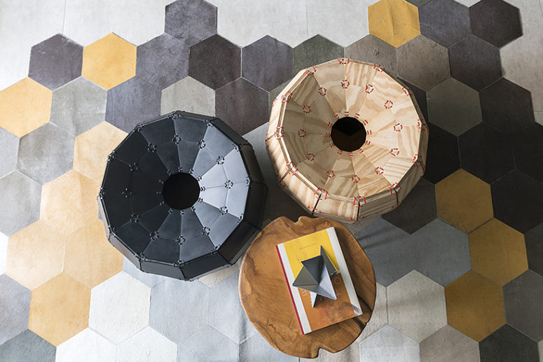 The central table and benches on the tiled floor are hybrid pieces that can be changed and used wherver the owners want The central table and benches on the tiled floor are hybrid pieces that can be changed and used wherver the owners want