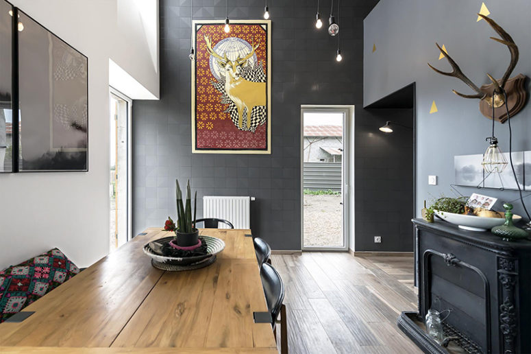 There's a bold artwork and faux taxidermy to cheer up the space